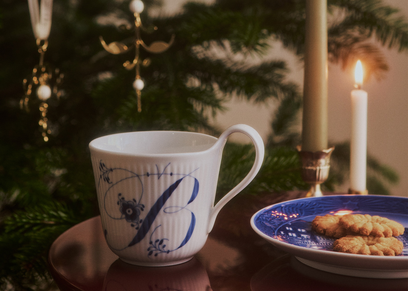 An Alphabet cup in a cosy Christmas setting